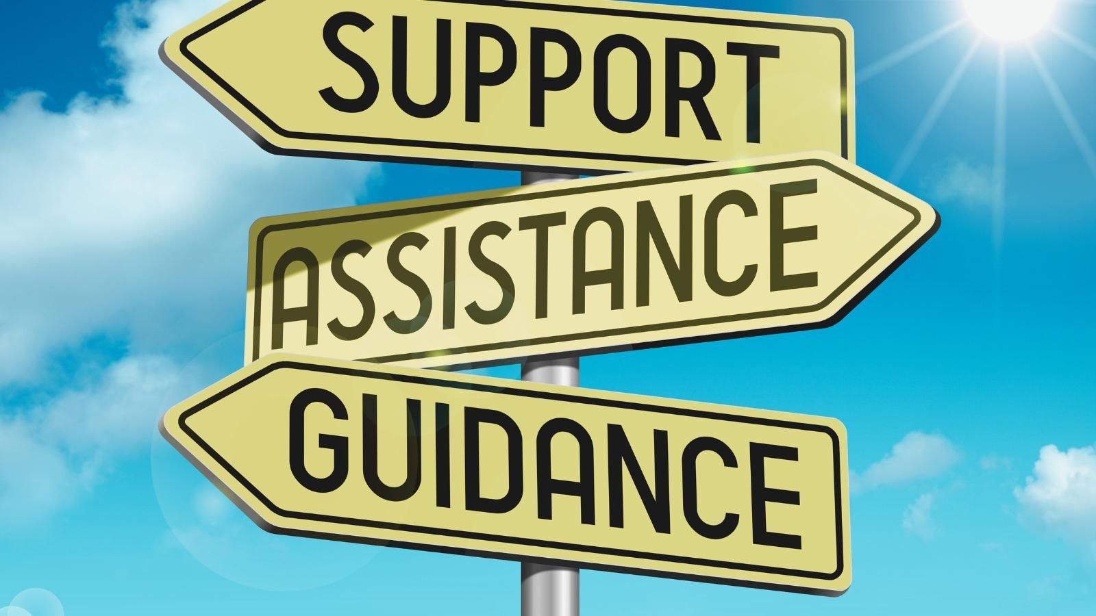 A sign that says support assistance guidance on it