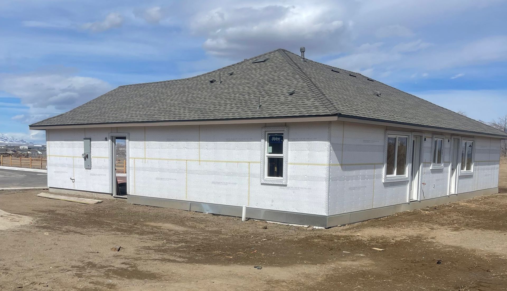 New home with stucco prepation complete