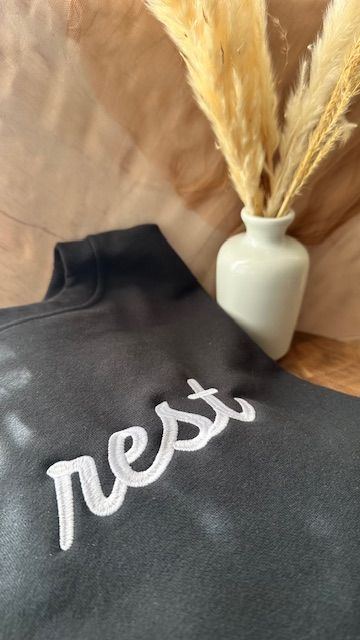 rest embroidered crewneck, minimal cozy sweatshirt, quiet luxury neutral, soft reminders design, trending cozy fit edit