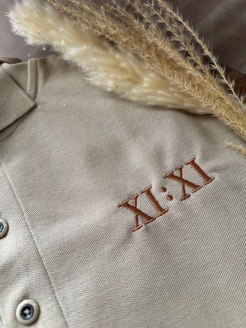 xi:xi embroidered polo, premium shirt, minimalist logo design, quiet luxury aesthetic, timing, elevated everyday wear