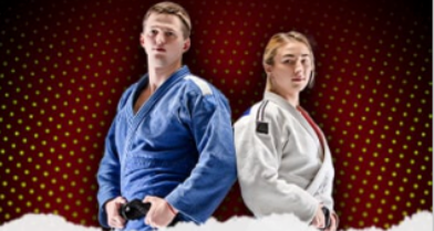 A man and a woman are standing next to each other in karate uniforms.