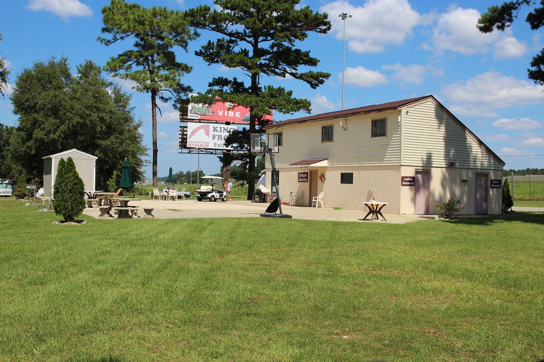 A house with a billboard above it that says fire