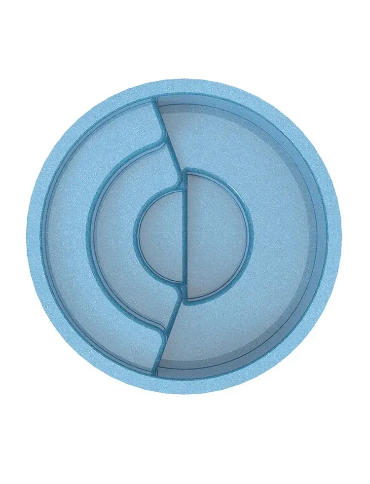 Blue circular divided food tray with four compartments.