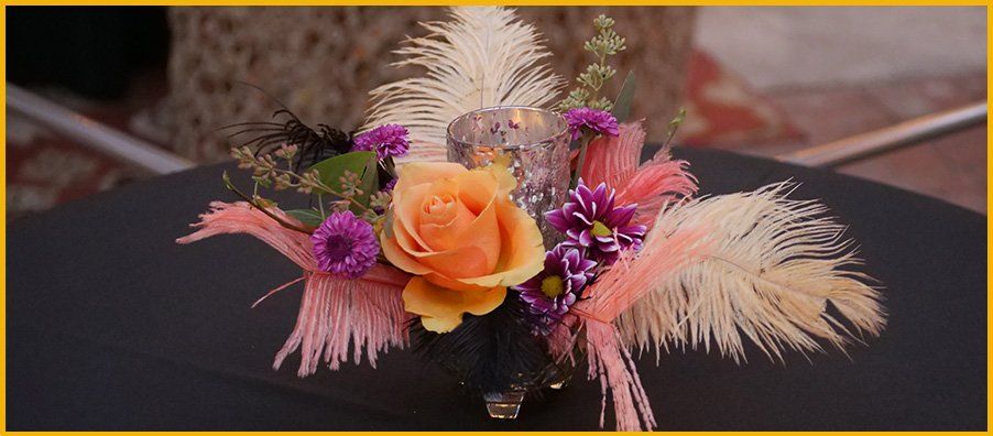 Feathers and flowers center piece