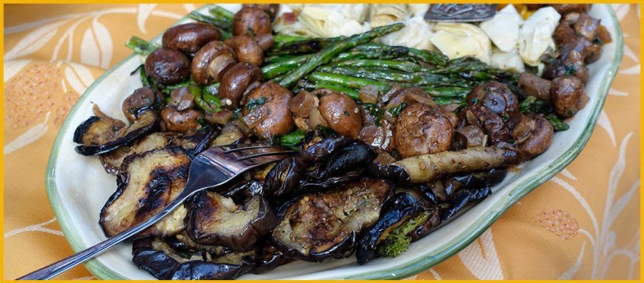 Antipasti platter marinated mushrooms eggplant asparagus