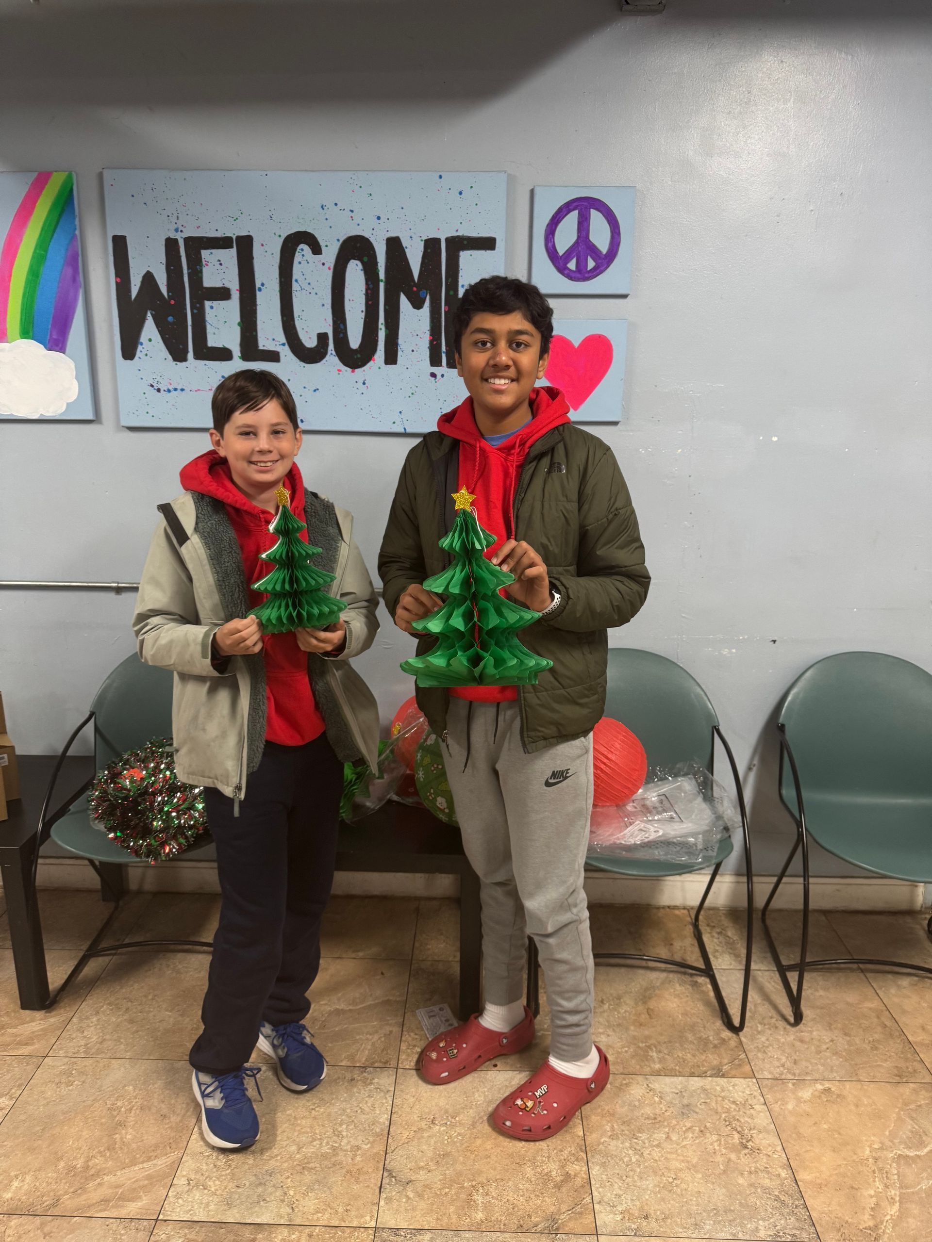 Volunteers Decorating a homeless warming/drop-in shelter