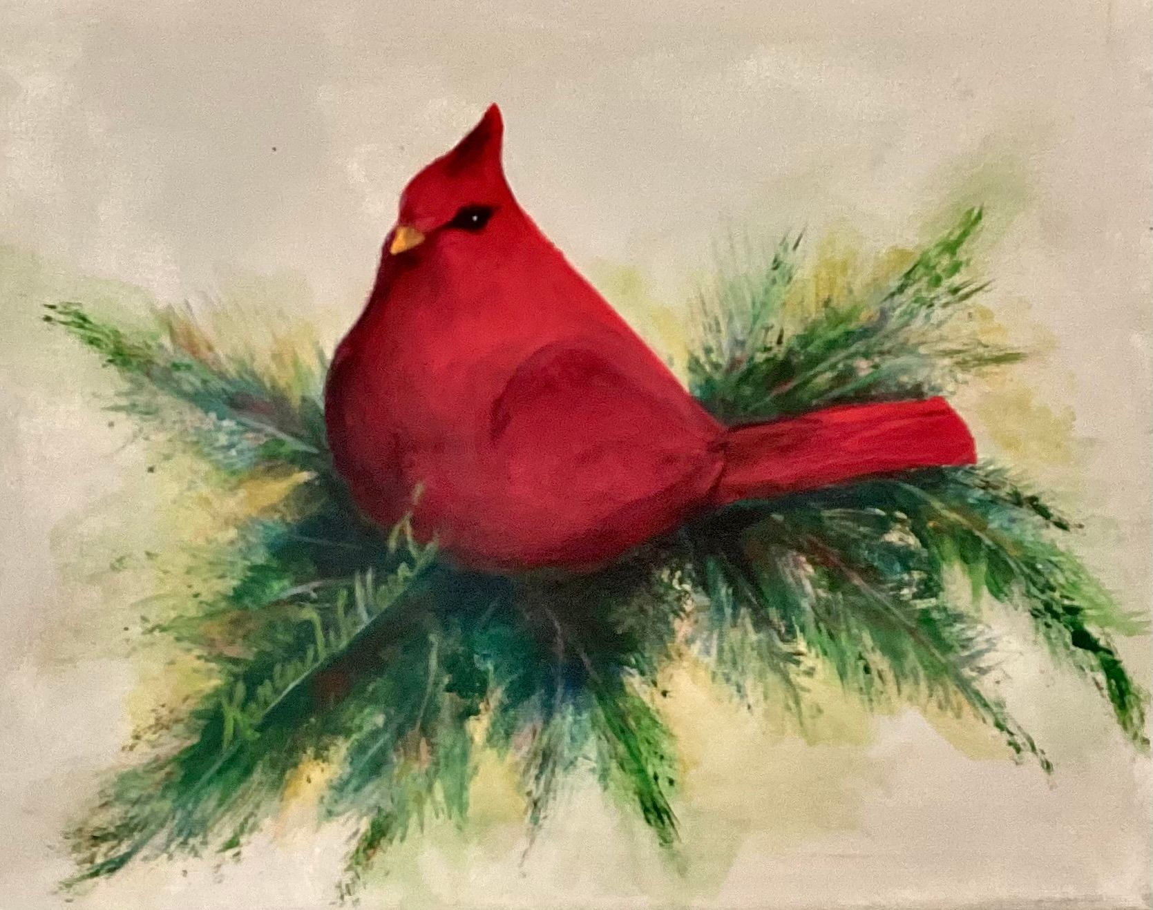 Red cardinal bird perched on green evergreen branches.