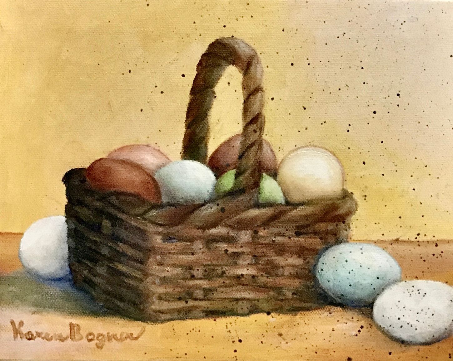 Basket filled with brown, white, and speckled blue eggs, with a few eggs scattered nearby, on a gold background.