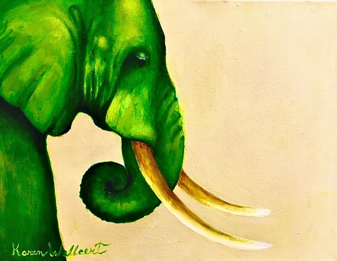 Green elephant with ivory tusks against a tan background.