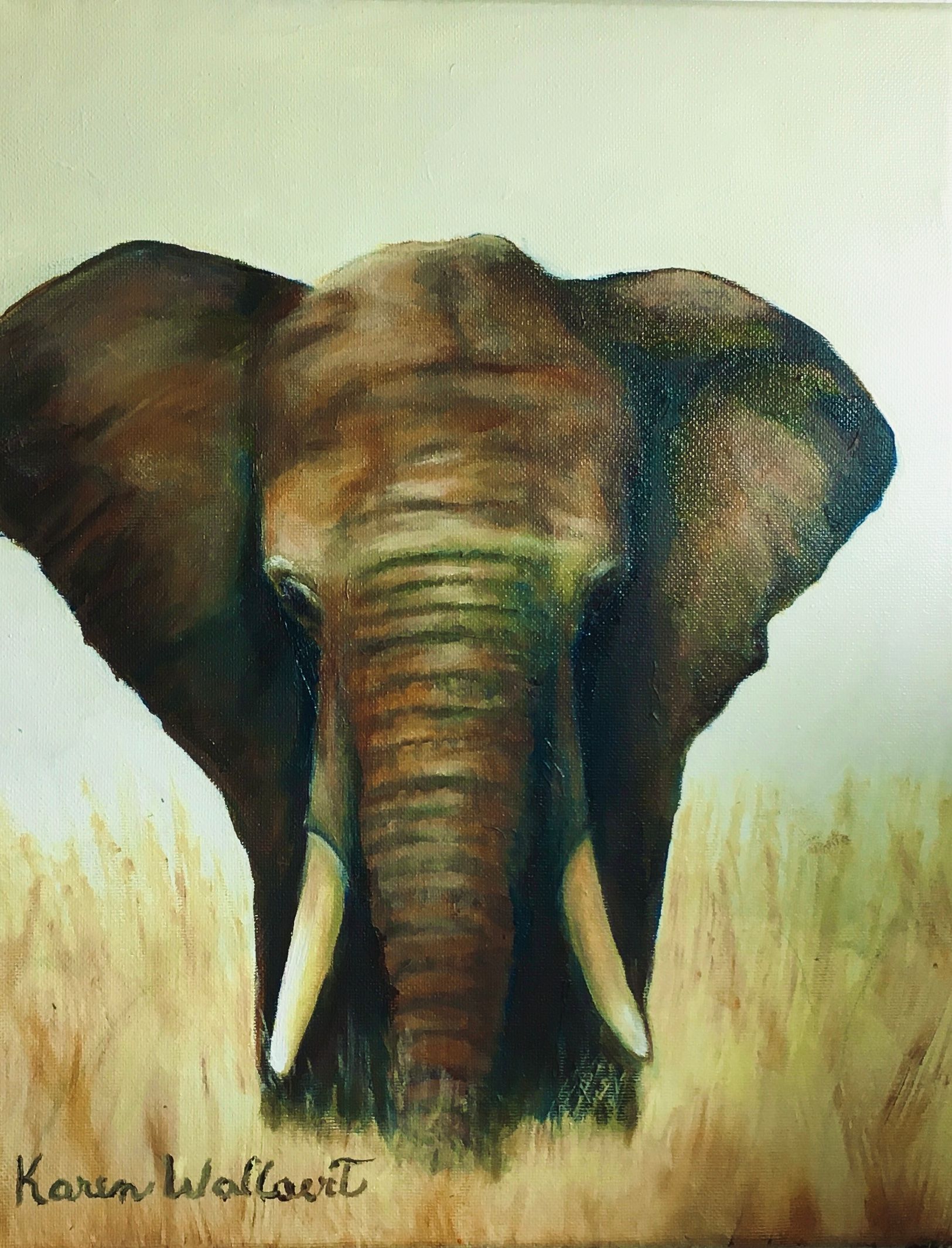 Elephant painting, brown tones. Front view of elephant, ivory tusks, grassy field, cream sky.