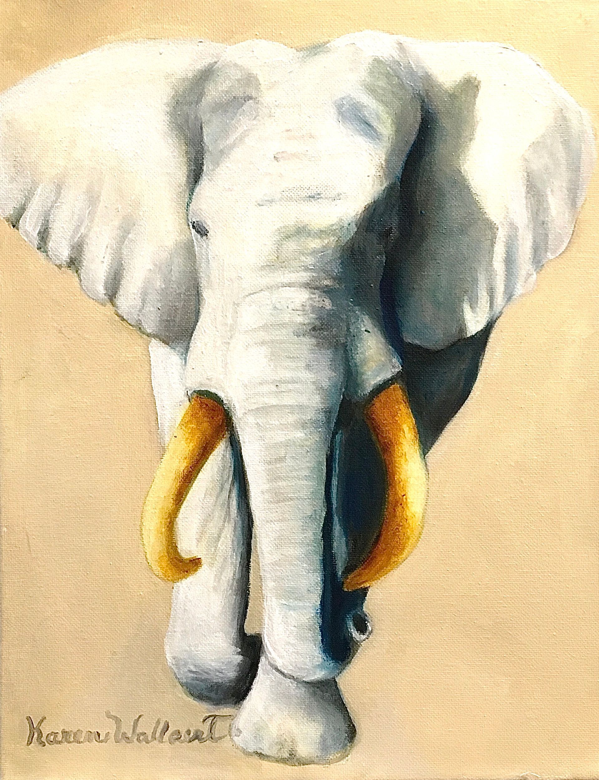 White elephant with golden tusks walking forward, beige background.