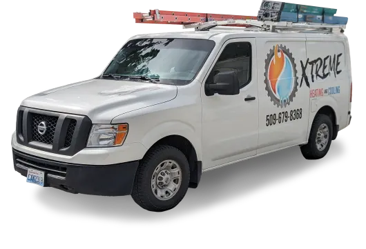 A white van with a ladder on top of it and the word Xtreme on the side.