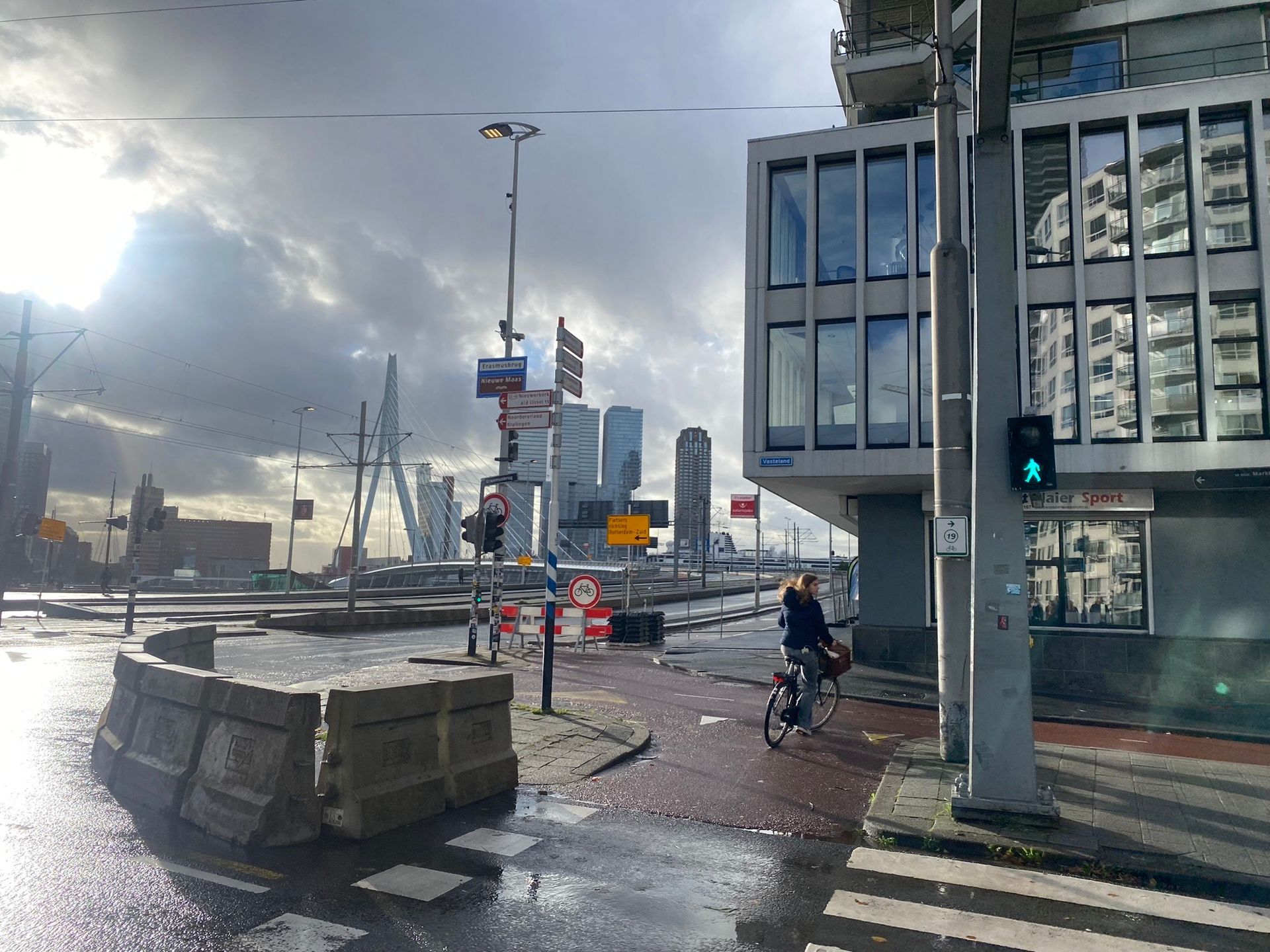 photo of girl riding bicycle in city