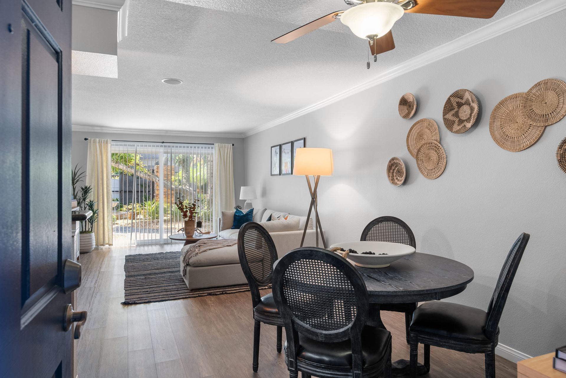 Front door and dining room in apartment