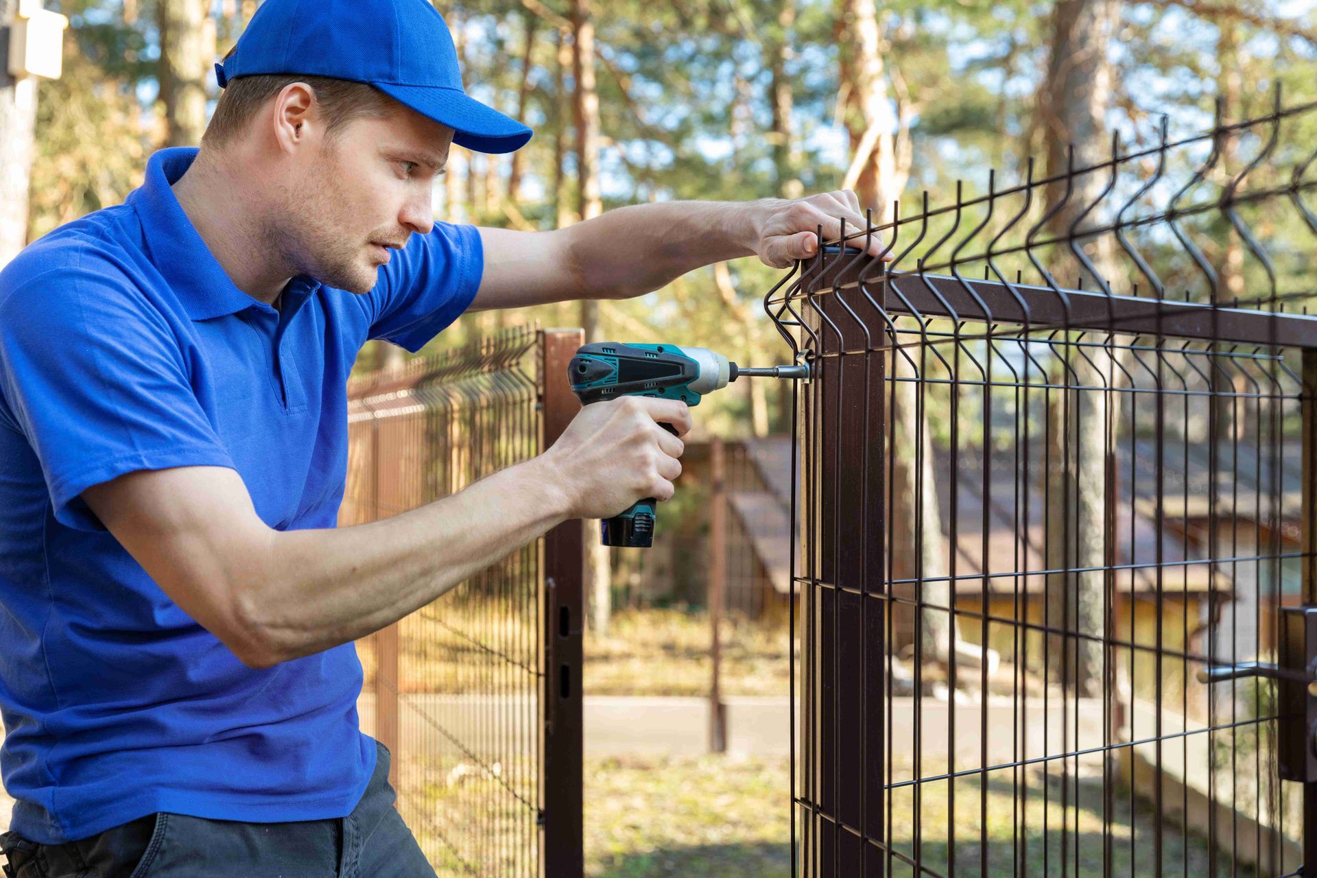 Man installing fence
