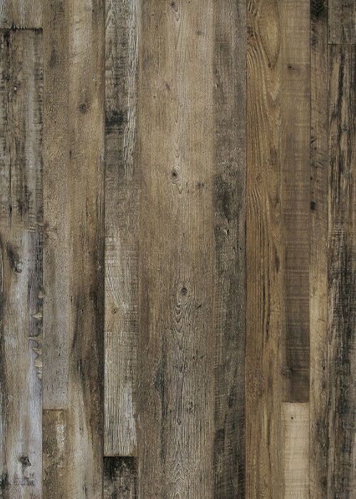 Distressed wood flooring in shades of brown, gray, and tan with visible grain and knots.