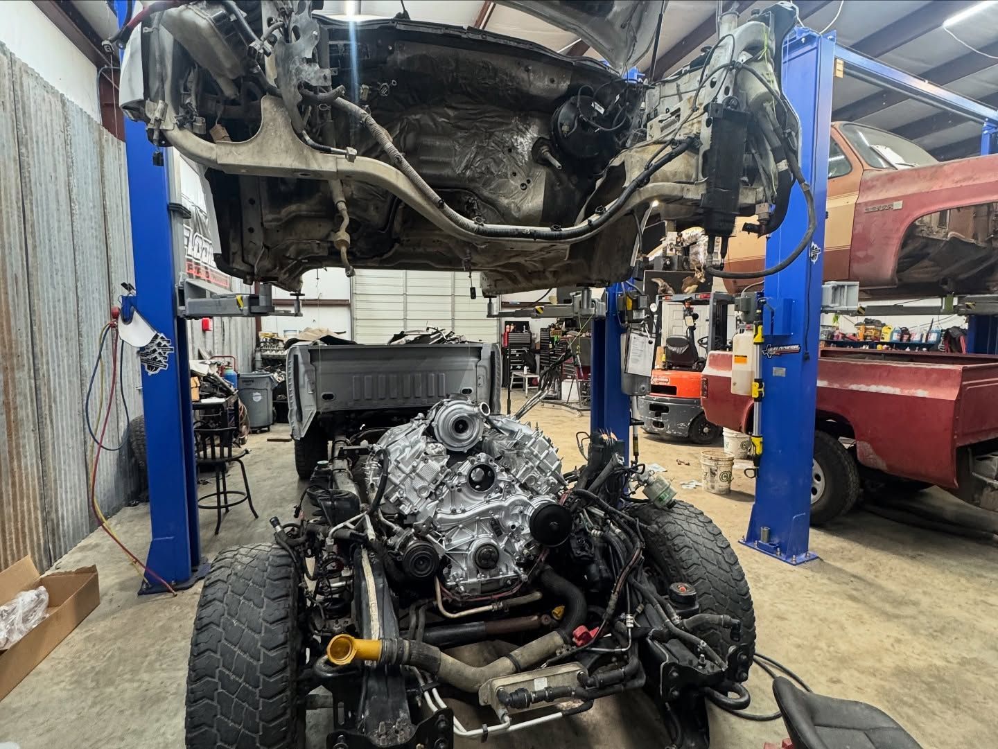 Truck Chassis on a Lift | Flo Diesel Performance