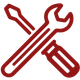 Red wrench and screwdriver crossed in a tools icon