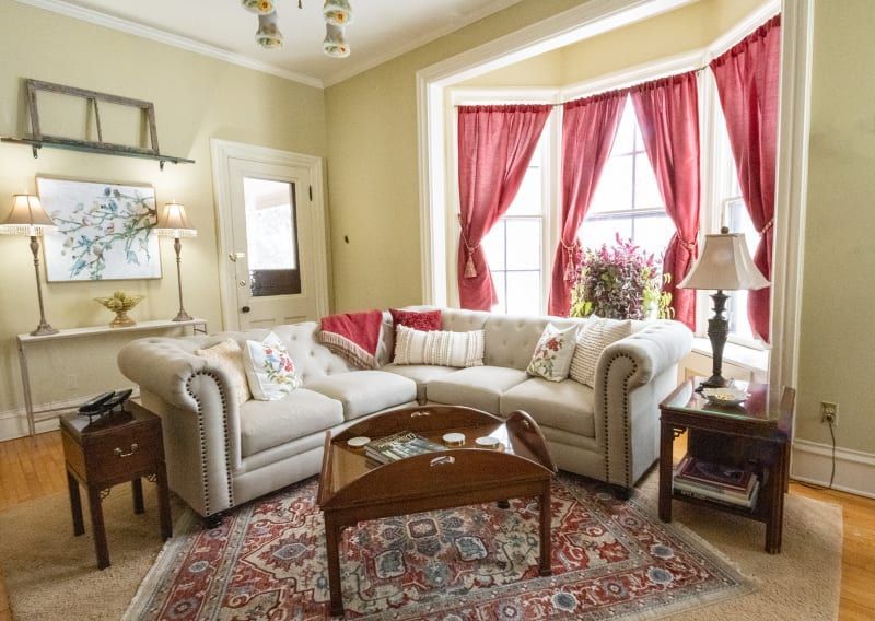A living room with a couch and a coffee table