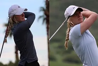 Two women are playing golf on a golf course.