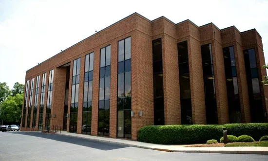 A large brick building with a lot of windows