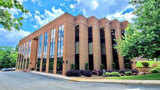 A large brick building with a lot of windows