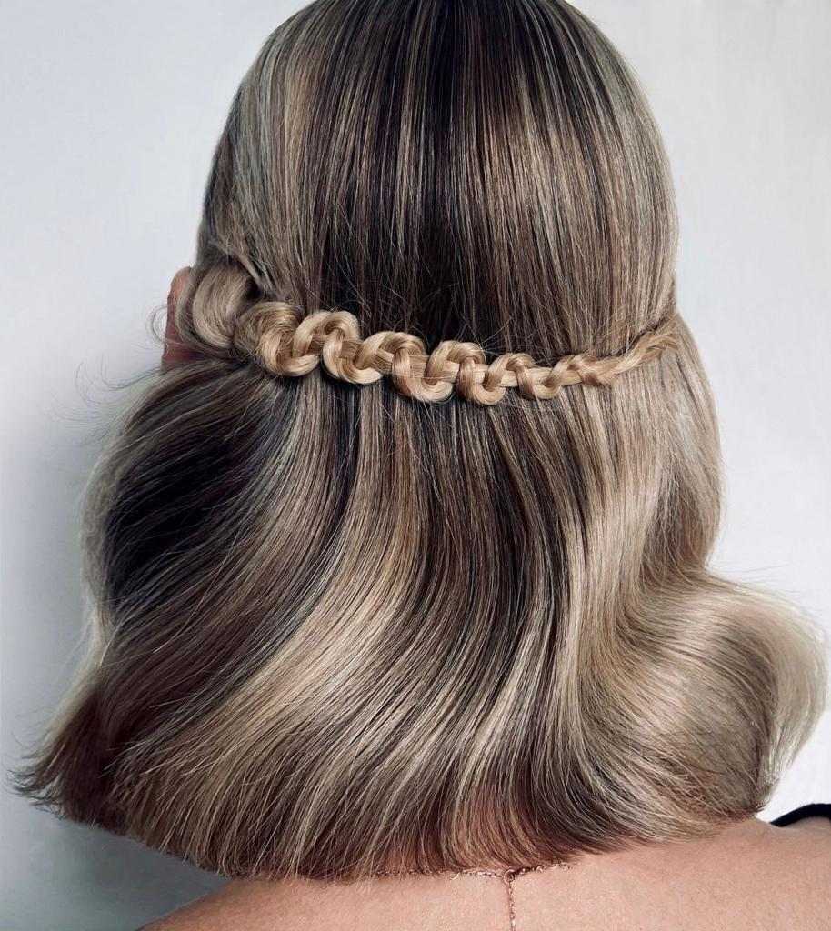 Acconciatura con treccia