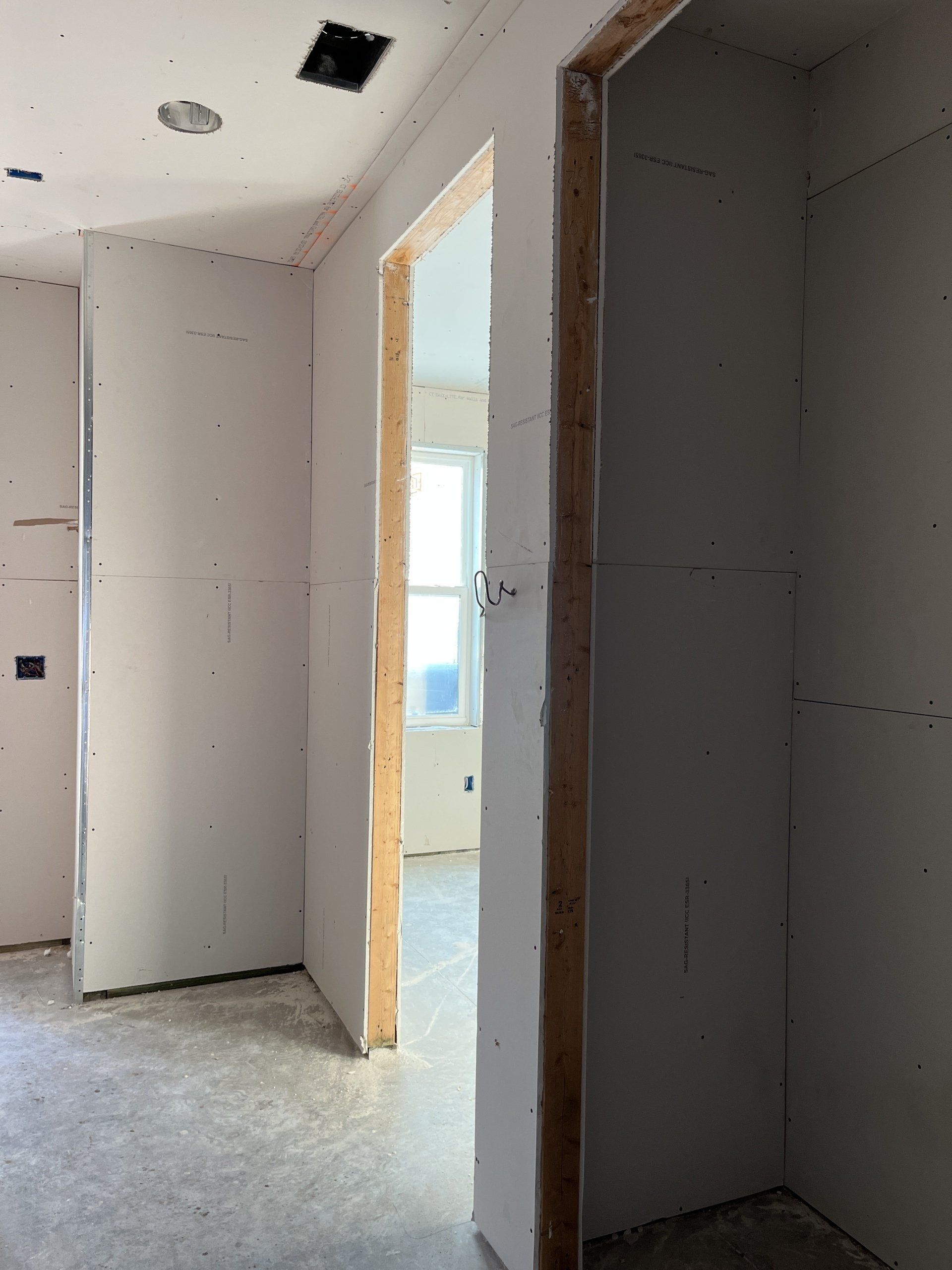 inside Tampa townhome, drywall has been hung but not finished or painted