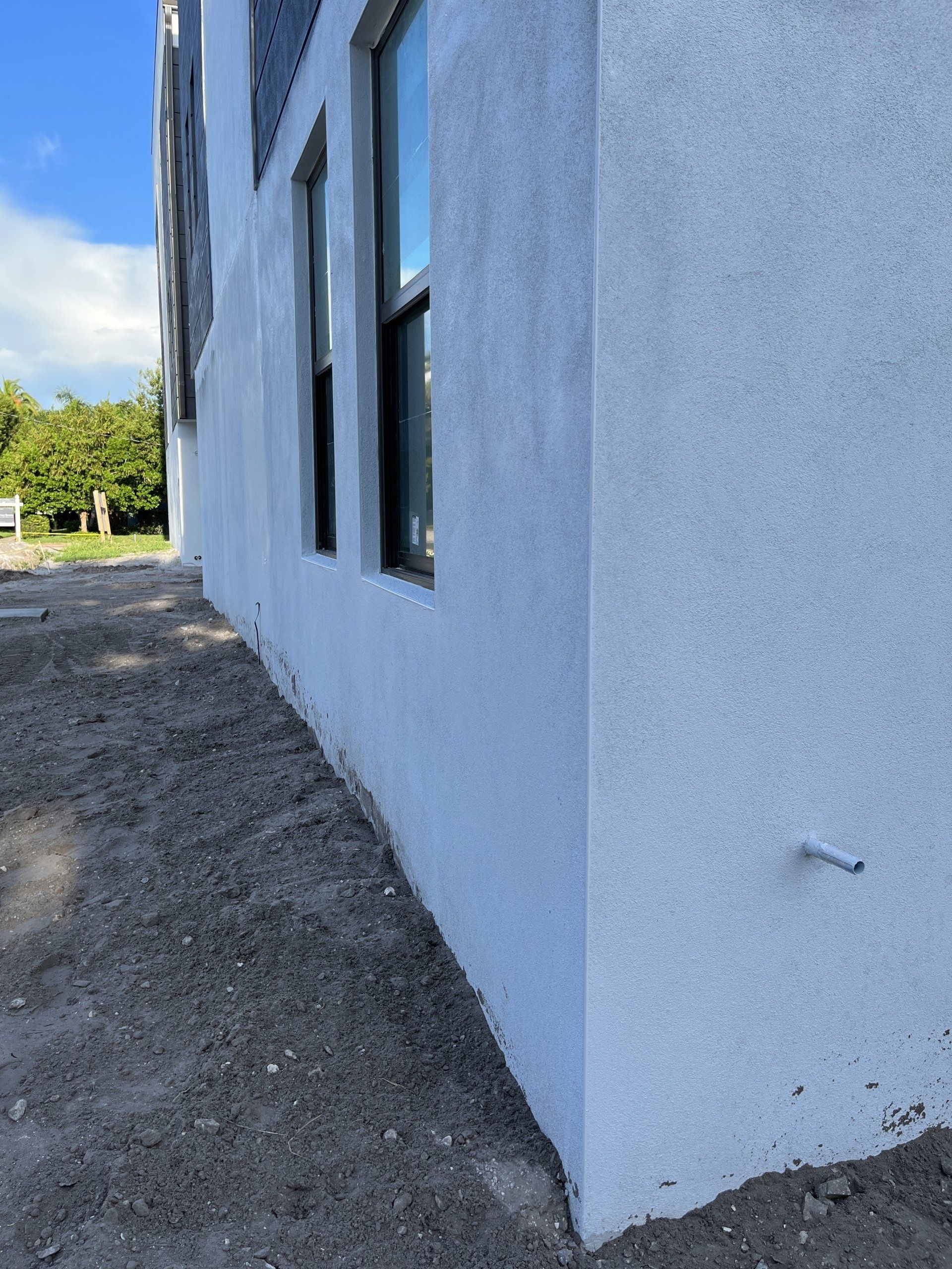 new construction, outside stucco finish with slight texture