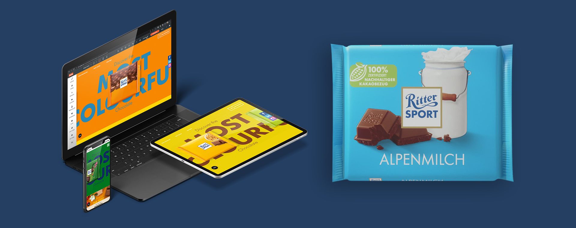 Una computadora portátil, una tableta y una barra de chocolate sobre un fondo azul.