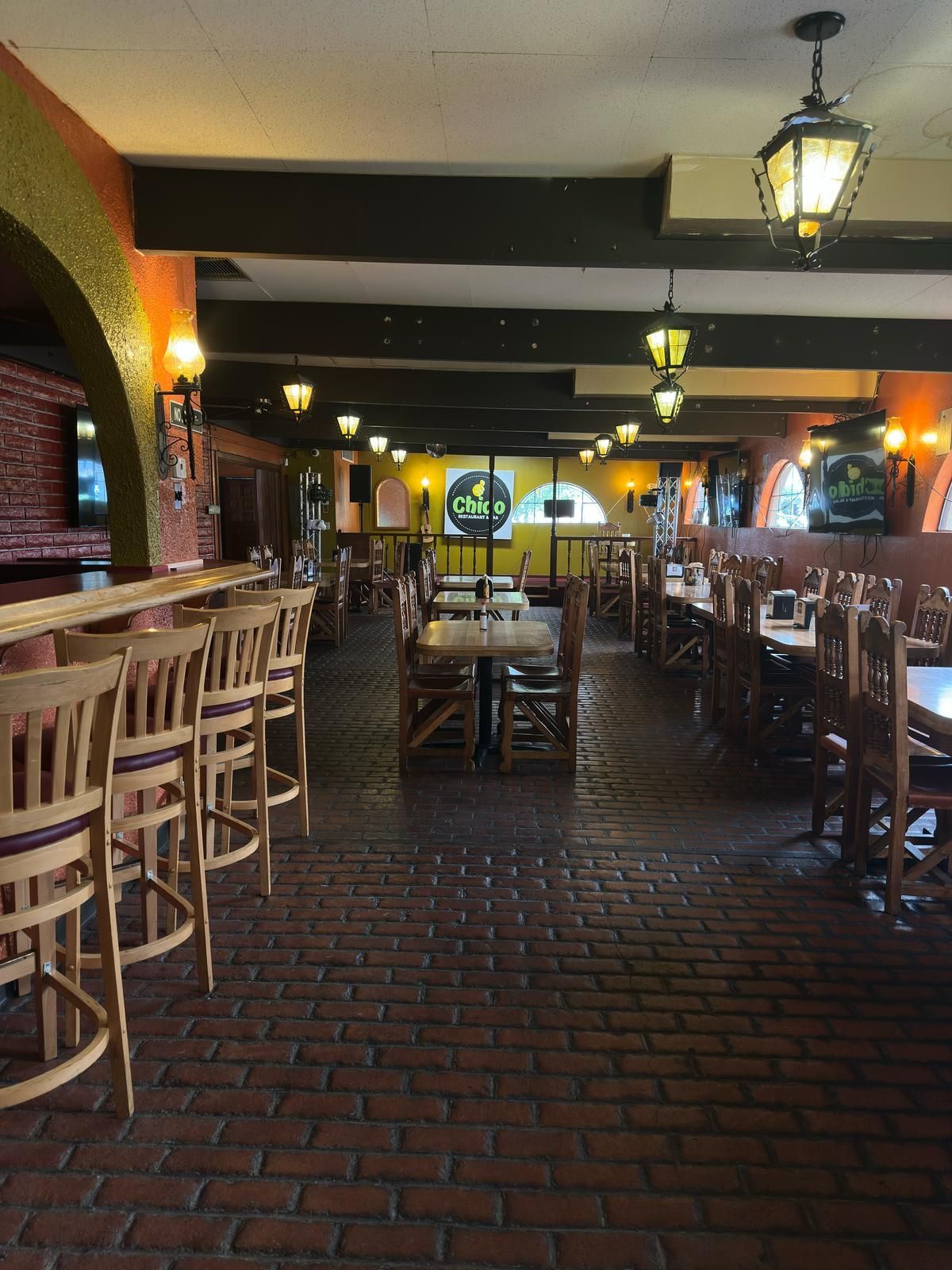 a picture of a chido restaurant with plates of food in front of it