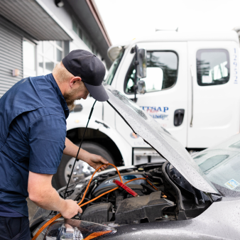 Mechanic Working on Engine | Kitsap Chico Towing