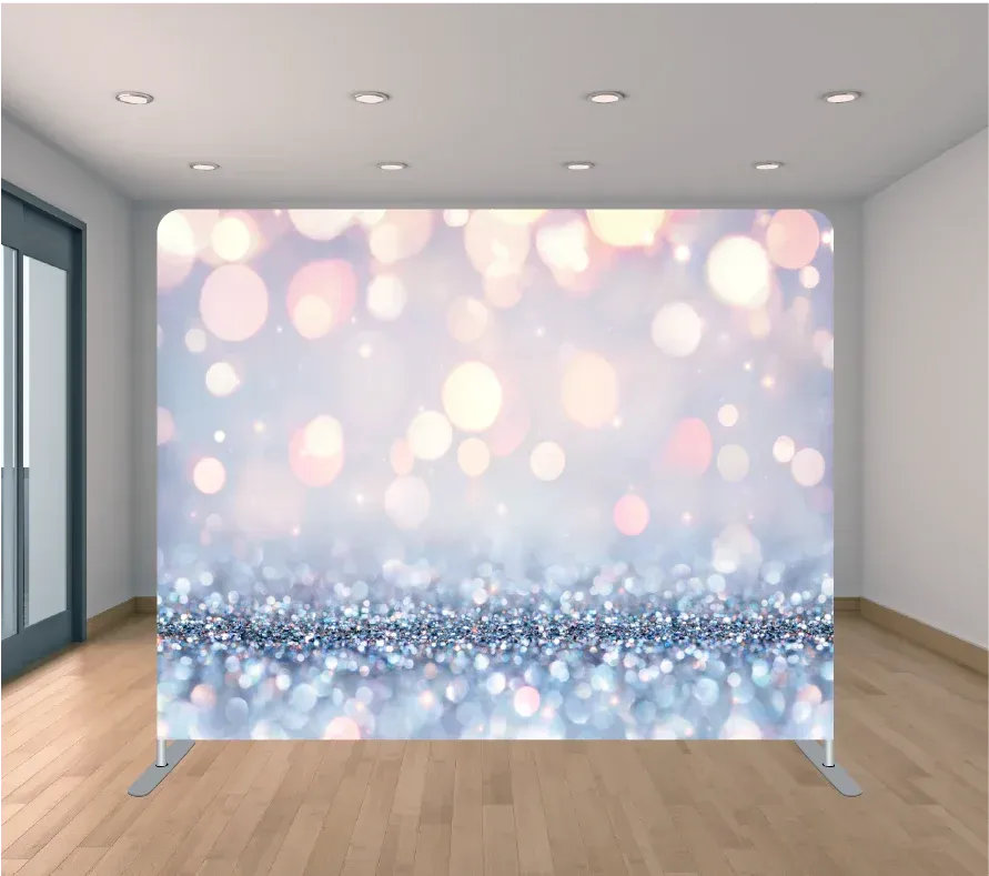 A room with a wooden floor and a wall with a picture on it.