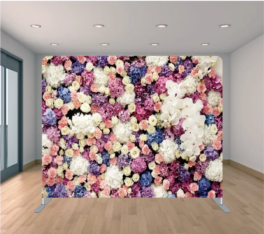 A room with a wall of flowers on it