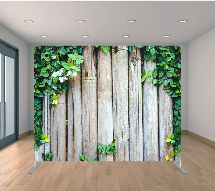 A wooden fence with ivy growing on it in a room.