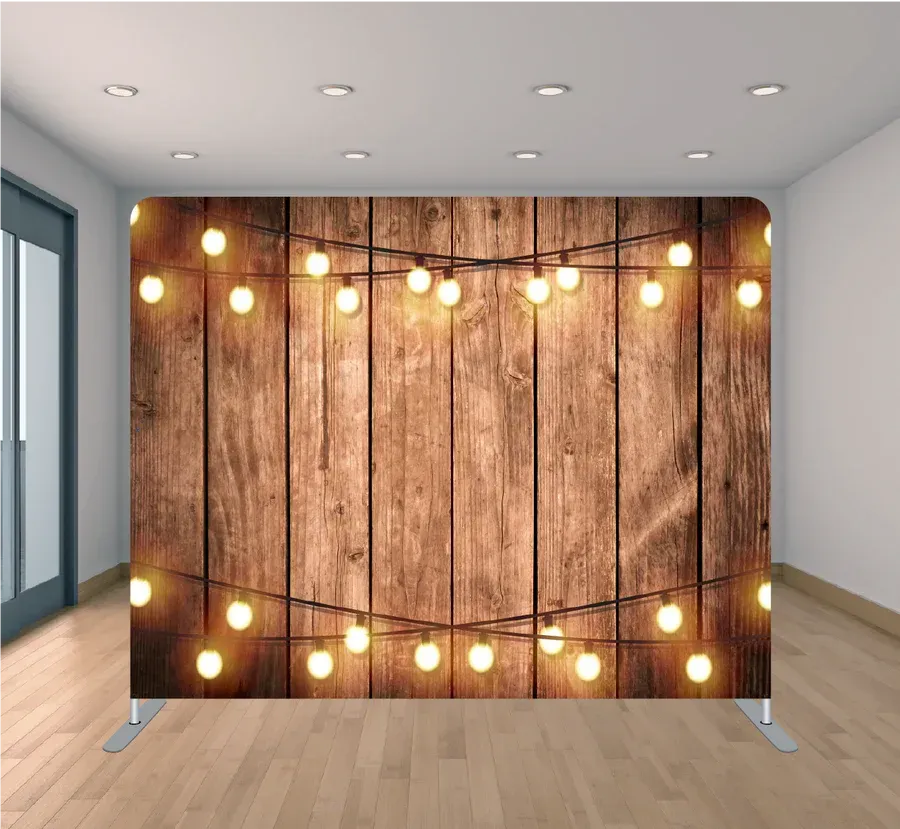A wooden wall with a string of lights on it in a room.