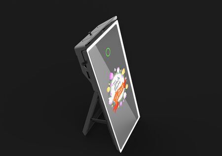 A smart phone is sitting on a stand on a black background.