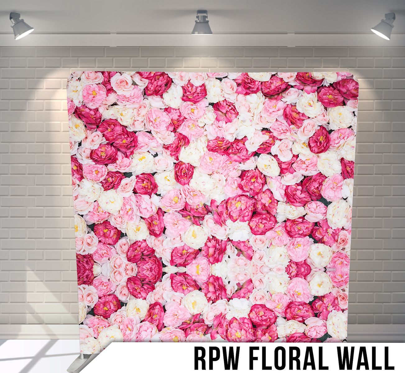 A floral wall with pink and white flowers on it