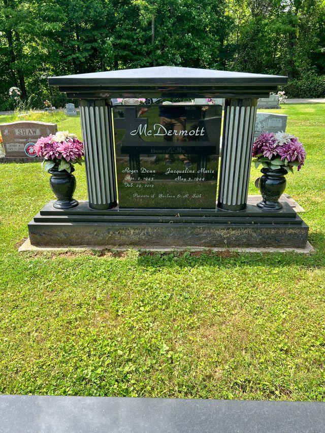 Custom granite memorial headstones at Portsmouth Monument Co. showroom