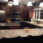 Bathroom vanity with stone countertop installed by Portsmouth Monument Co.