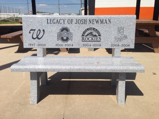 A granite bench that says legacy of josh newman