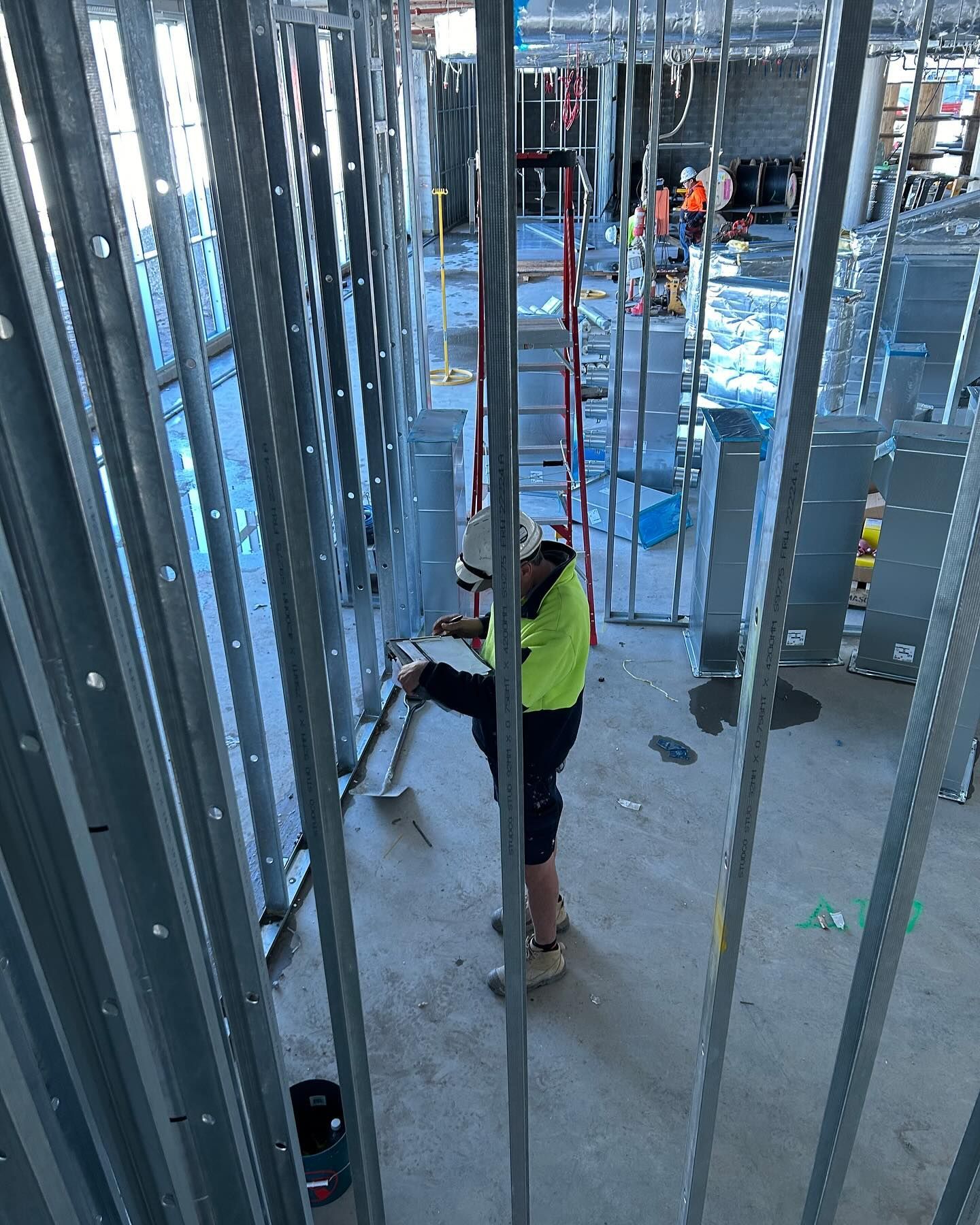 Construction Worker in a Yellow Shirt and Shorts — Hunter Fire & Safety in Edgeworth, NSW