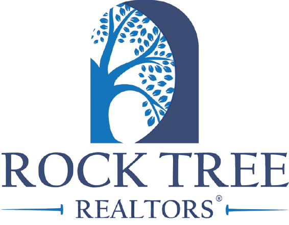 Rock Tree Realtors logo with a tree inside a blue archway, with the company name below.