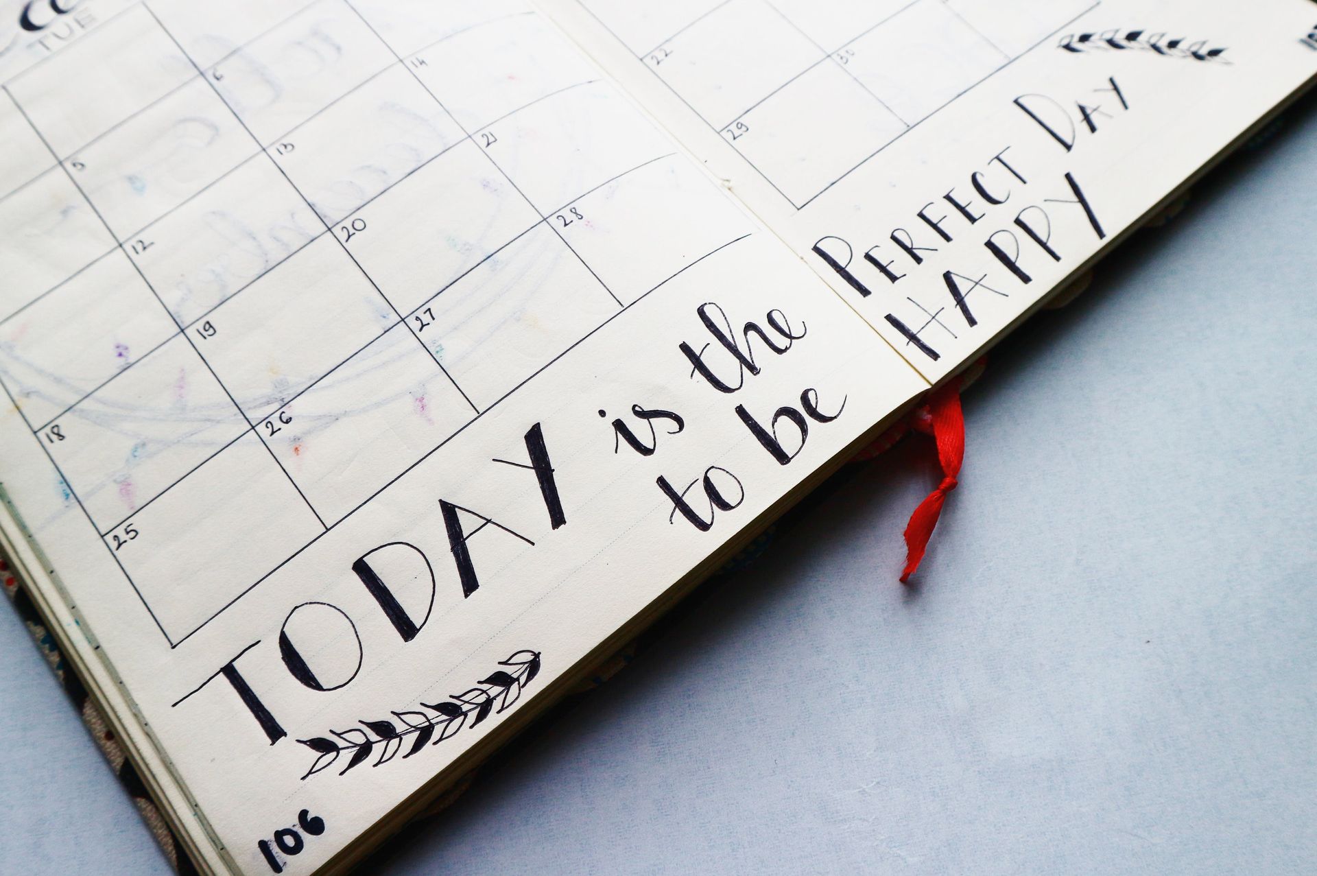 A calendar that says today is the time to be happy