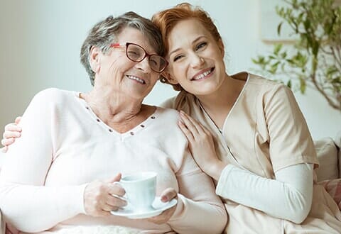 Nurse Smiling with Patient — Senior Care Giving in Prescott, AZ