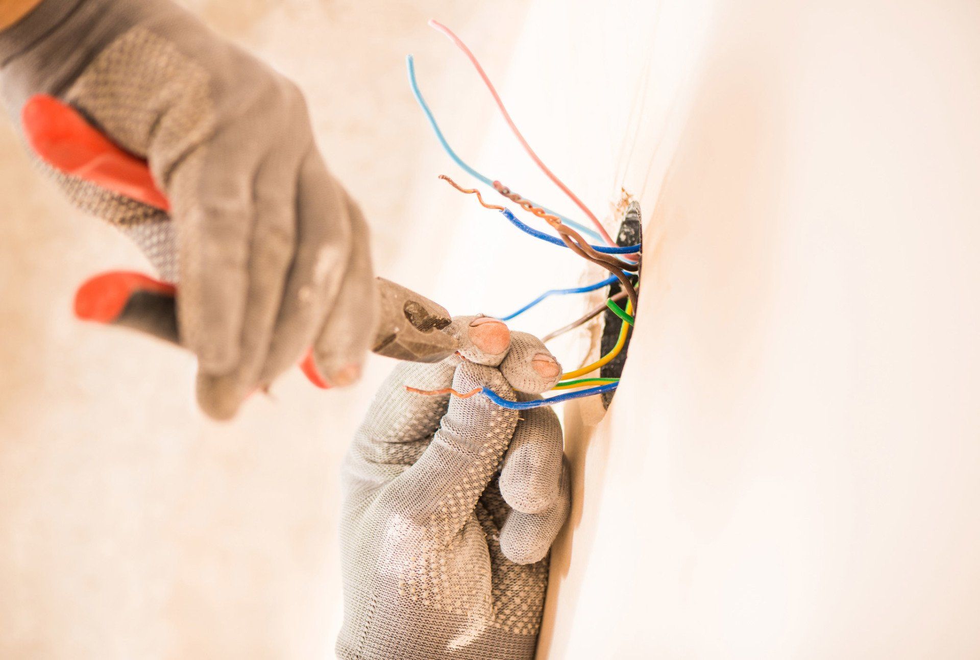 Electrical Services — Electrician Fixing the Wire in Venice, FL