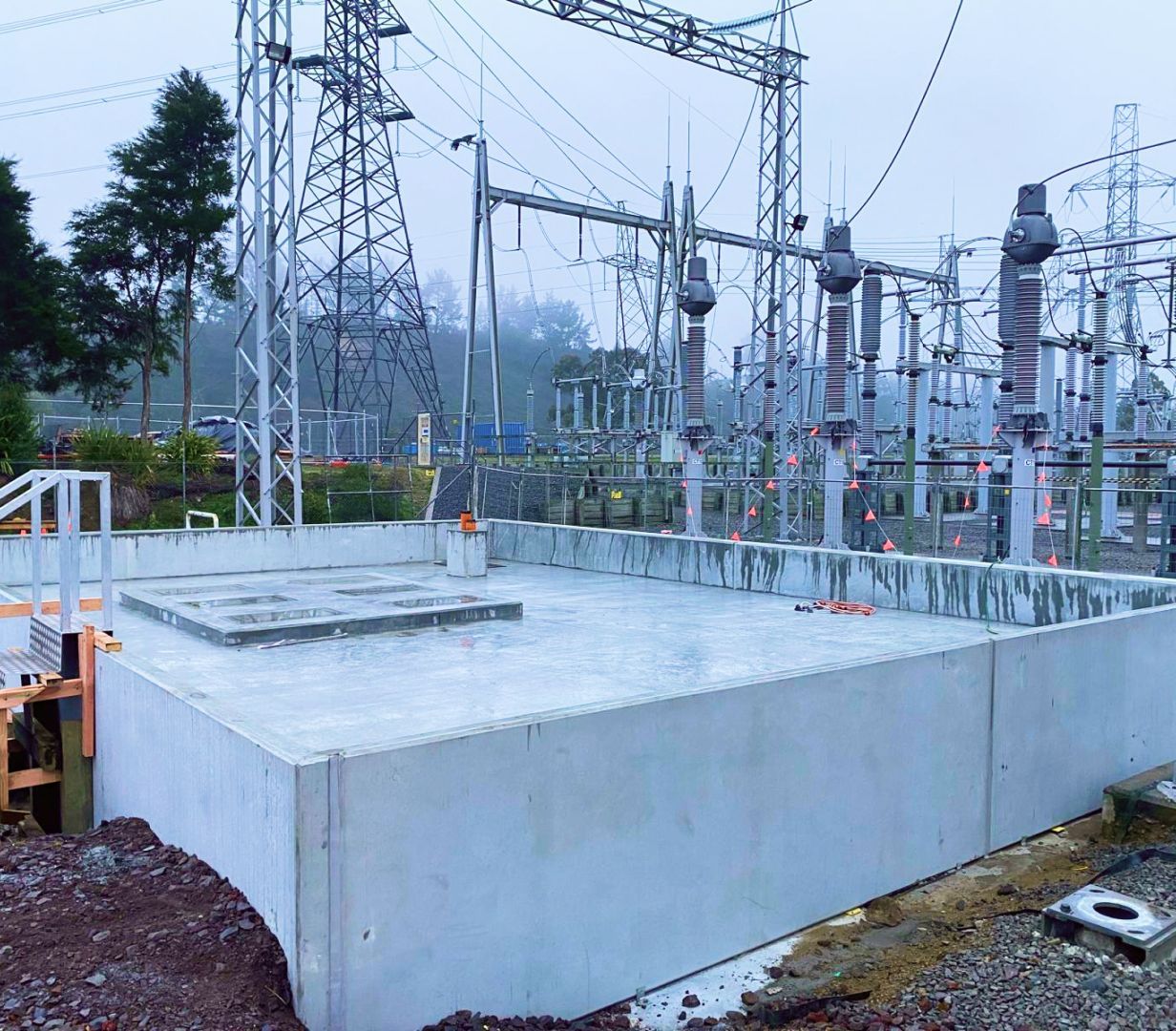 A construction site with a lot of power lines