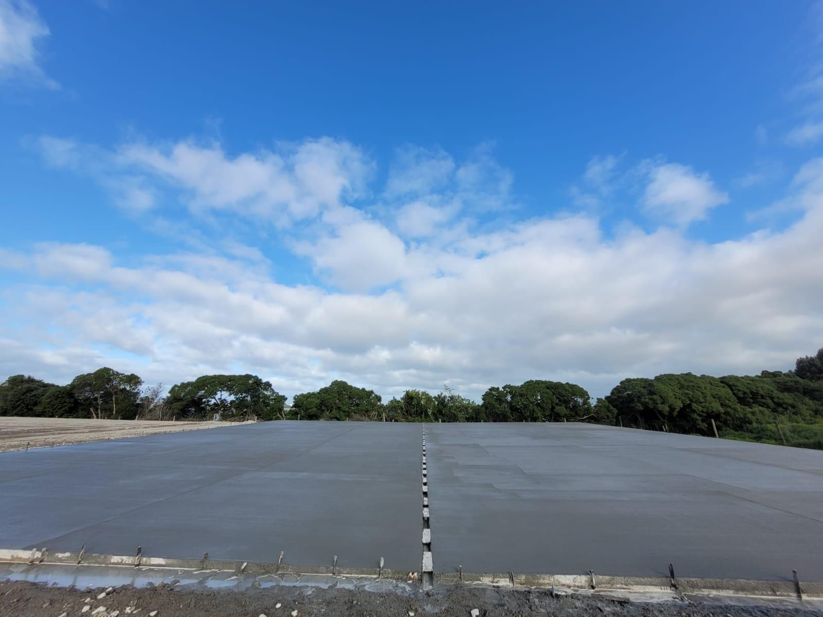 A large body of water with trees in the background
