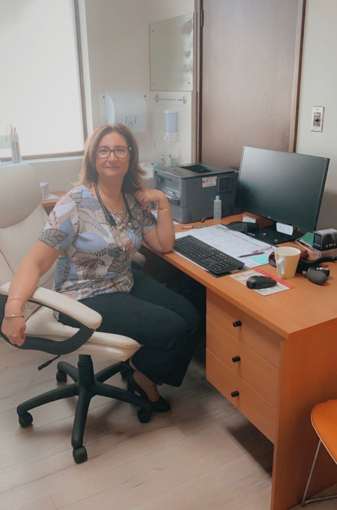 female Doctor in her office