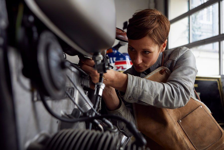 woman working in the repair workshop